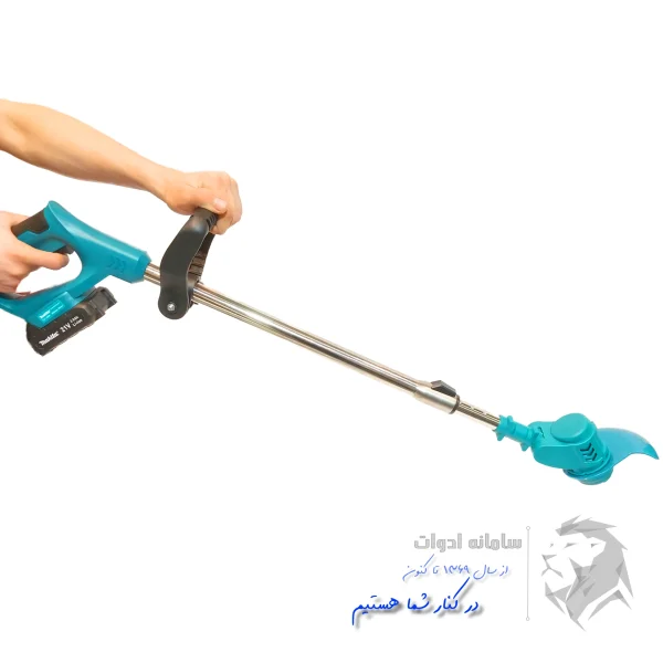 تصویر علف زن شارژی ماکیتا در دست